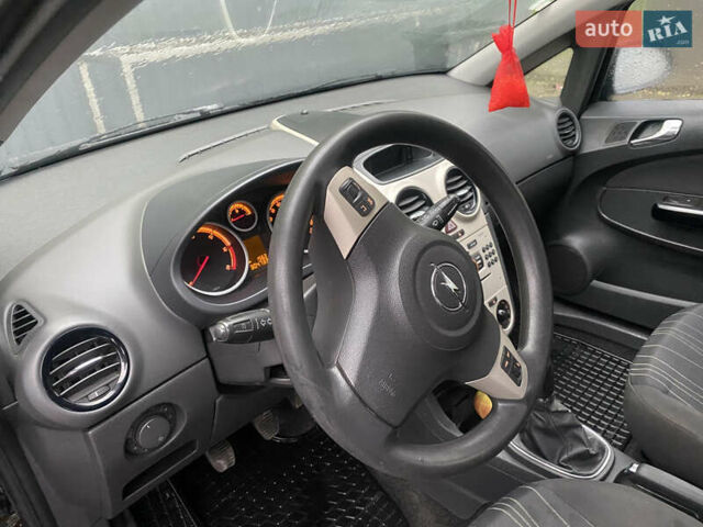 Черный Опель Корса, объемом двигателя 1.25 л и пробегом 309 тыс. км за 3500 $, фото 7 на Automoto.ua