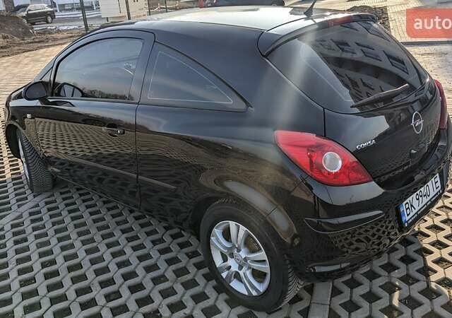 Черный Опель Корса, объемом двигателя 1.4 л и пробегом 253 тыс. км за 5599 $, фото 25 на Automoto.ua
