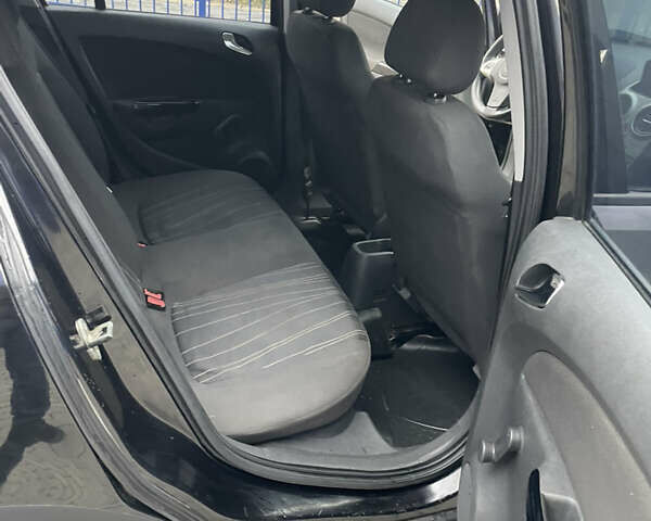 Черный Опель Корса, объемом двигателя 1.2 л и пробегом 210 тыс. км за 3200 $, фото 18 на Automoto.ua