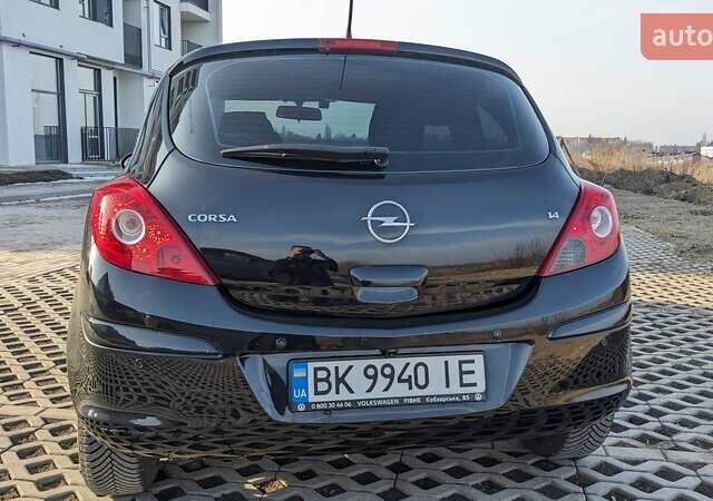 Черный Опель Корса, объемом двигателя 1.4 л и пробегом 253 тыс. км за 5599 $, фото 12 на Automoto.ua