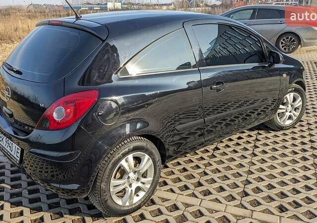 Черный Опель Корса, объемом двигателя 1.4 л и пробегом 253 тыс. км за 5599 $, фото 28 на Automoto.ua