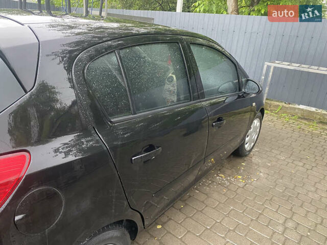 Черный Опель Корса, объемом двигателя 1.25 л и пробегом 309 тыс. км за 3500 $, фото 4 на Automoto.ua
