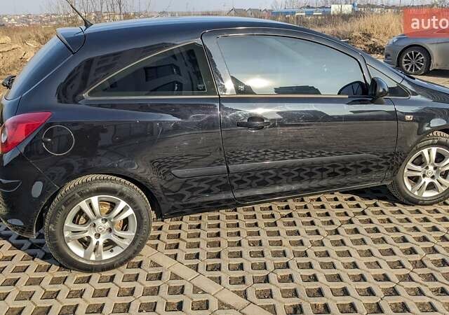 Черный Опель Корса, объемом двигателя 1.4 л и пробегом 253 тыс. км за 5599 $, фото 29 на Automoto.ua