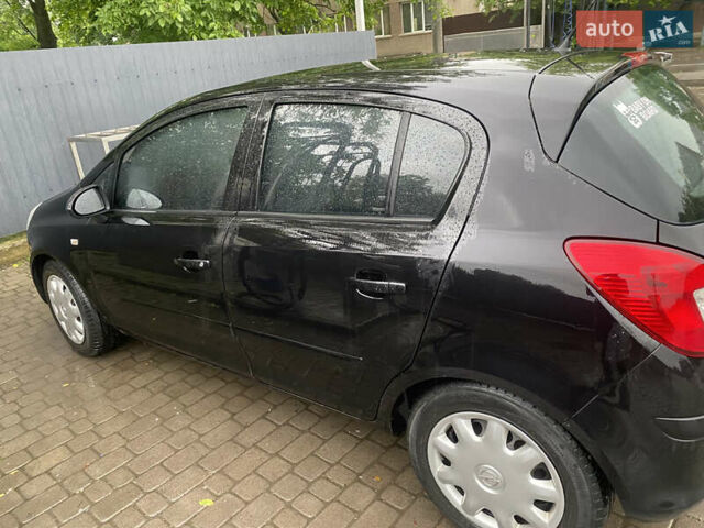 Черный Опель Корса, объемом двигателя 1.25 л и пробегом 309 тыс. км за 3500 $, фото 6 на Automoto.ua