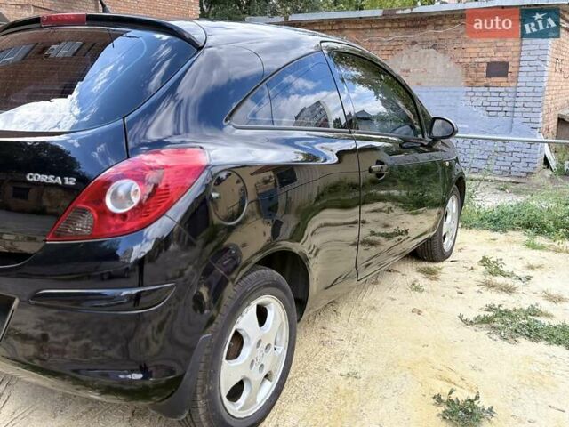 Черный Опель Корса, объемом двигателя 1.2 л и пробегом 209 тыс. км за 4200 $, фото 4 на Automoto.ua