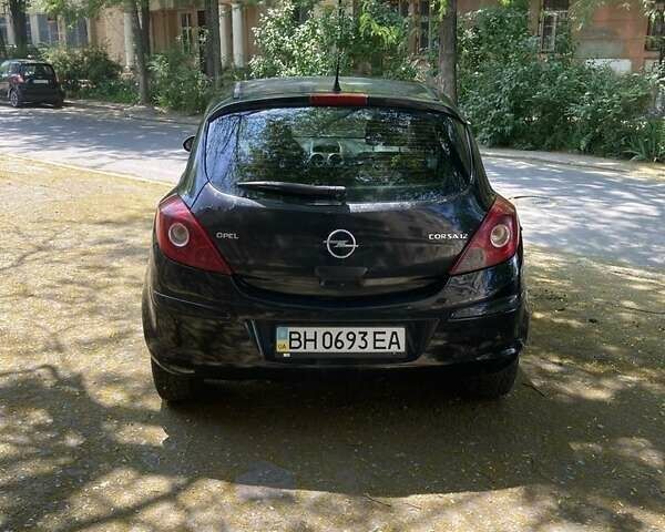 Черный Опель Корса, объемом двигателя 1.2 л и пробегом 204 тыс. км за 3800 $, фото 2 на Automoto.ua