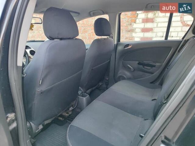 Черный Опель Корса, объемом двигателя 1.34 л и пробегом 170 тыс. км за 4800 $, фото 6 на Automoto.ua