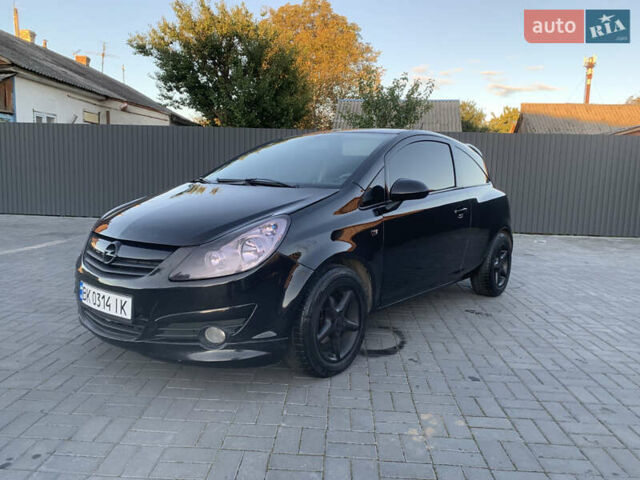 Черный Опель Корса, объемом двигателя 1.3 л и пробегом 265 тыс. км за 4200 $, фото 2 на Automoto.ua