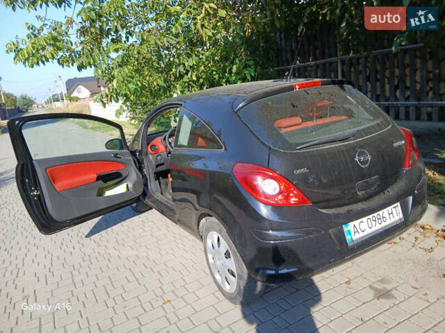 Черный Опель Корса, объемом двигателя 1.4 л и пробегом 240 тыс. км за 4714 $, фото 2 на Automoto.ua