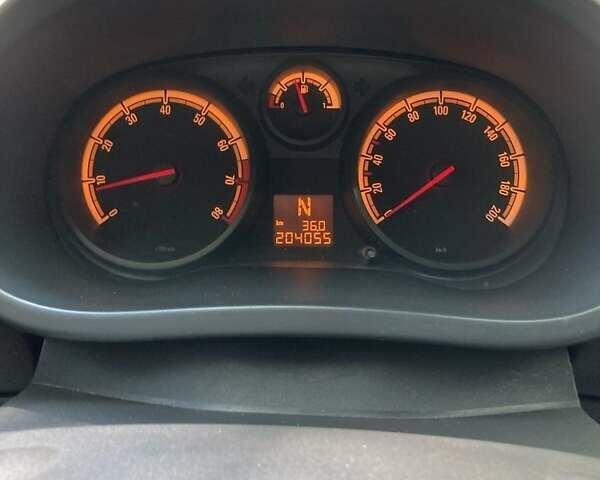 Черный Опель Корса, объемом двигателя 1.2 л и пробегом 204 тыс. км за 3800 $, фото 4 на Automoto.ua