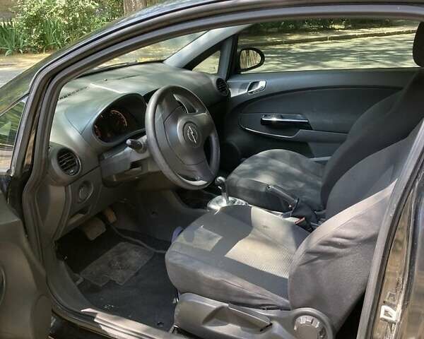 Черный Опель Корса, объемом двигателя 1.2 л и пробегом 204 тыс. км за 3800 $, фото 3 на Automoto.ua