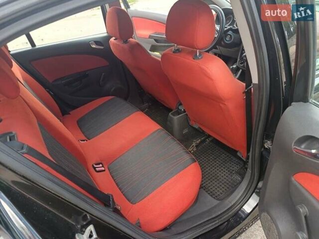 Чорний Опель Корса, об'ємом двигуна 1.2 л та пробігом 210 тис. км за 4200 $, фото 9 на Automoto.ua