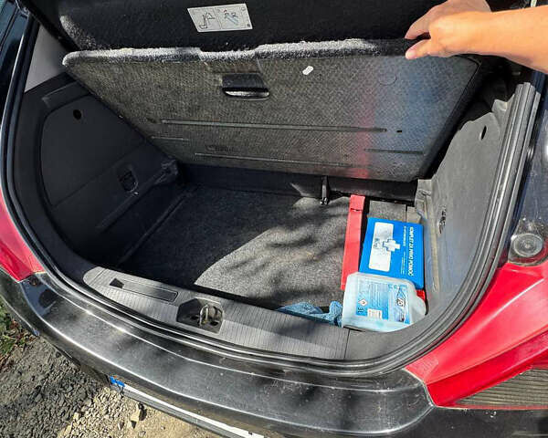 Черный Опель Корса, объемом двигателя 1.4 л и пробегом 240 тыс. км за 4714 $, фото 3 на Automoto.ua