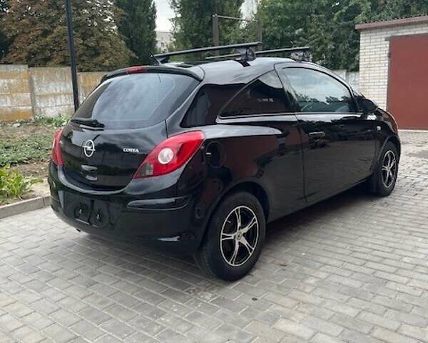 Чорний Опель Корса, об'ємом двигуна 1.23 л та пробігом 102 тис. км за 5500 $, фото 5 на Automoto.ua