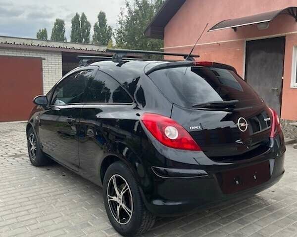 Чорний Опель Корса, об'ємом двигуна 1.23 л та пробігом 102 тис. км за 5500 $, фото 2 на Automoto.ua