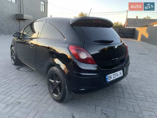 Черный Опель Корса, объемом двигателя 1.3 л и пробегом 265 тыс. км за 4200 $, фото 7 на Automoto.ua