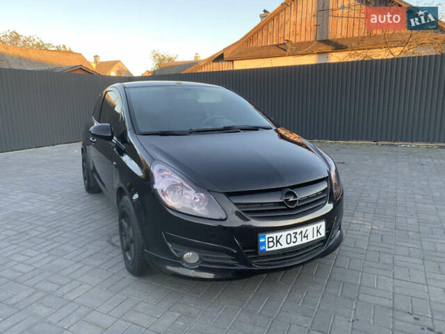Черный Опель Корса, объемом двигателя 1.3 л и пробегом 265 тыс. км за 4200 $, фото 15 на Automoto.ua