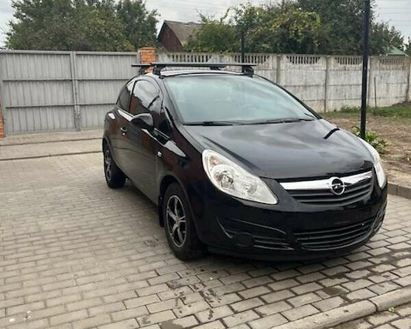 Чорний Опель Корса, об'ємом двигуна 1.23 л та пробігом 102 тис. км за 5500 $, фото 1 на Automoto.ua
