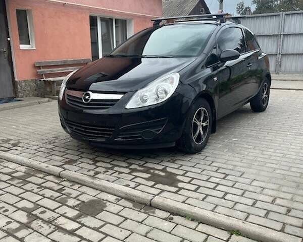 Чорний Опель Корса, об'ємом двигуна 1.23 л та пробігом 102 тис. км за 5500 $, фото 4 на Automoto.ua