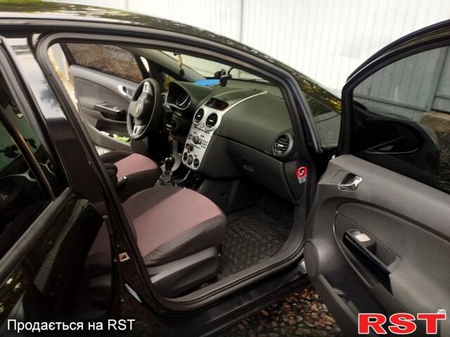 Черный Опель Корса, объемом двигателя 1.2 л и пробегом 203 тыс. км за 3500 $, фото 6 на Automoto.ua