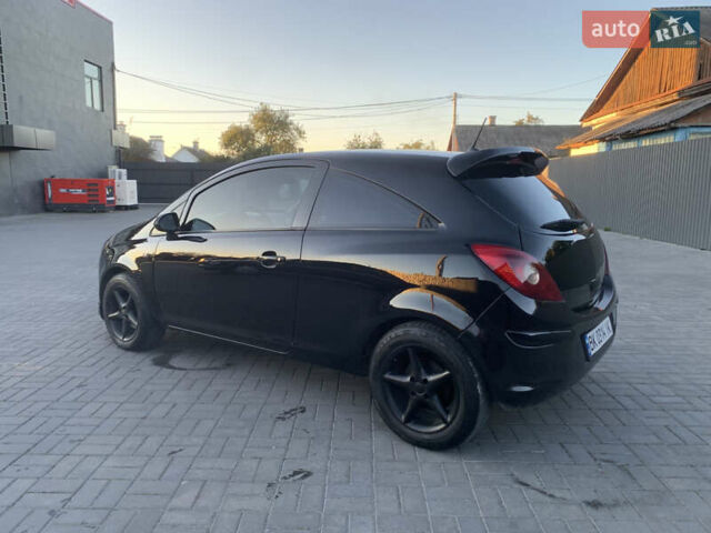 Черный Опель Корса, объемом двигателя 1.3 л и пробегом 265 тыс. км за 4200 $, фото 6 на Automoto.ua