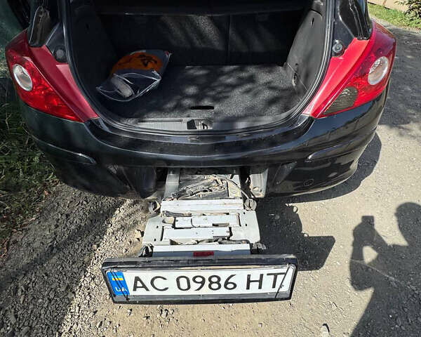 Черный Опель Корса, объемом двигателя 1.4 л и пробегом 240 тыс. км за 4714 $, фото 4 на Automoto.ua