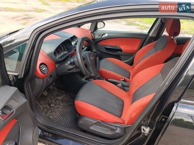 Чорний Опель Корса, об'ємом двигуна 1.2 л та пробігом 210 тис. км за 4200 $, фото 7 на Automoto.ua