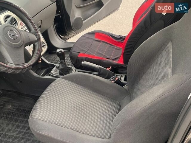 Черный Опель Корса, объемом двигателя 1.2 л и пробегом 224 тыс. км за 3700 $, фото 8 на Automoto.ua