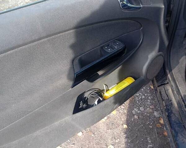 Опель Корса 2008 в Кегичевке на Automoto.ua Черный Опель Корса, объемом двигателя 1.23 л и пробегом 285 тыс. км за 3700 $, фото 7 на Automoto.ua