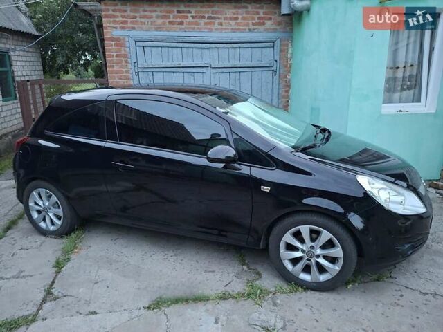 Черный Опель Корса, объемом двигателя 1 л и пробегом 225 тыс. км за 4700 $, фото 9 на Automoto.ua