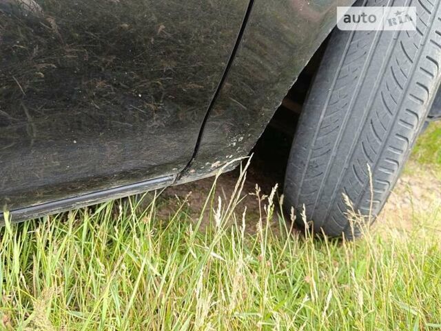 Черный Опель Корса, объемом двигателя 1.3 л и пробегом 233 тыс. км за 3599 $, фото 15 на Automoto.ua