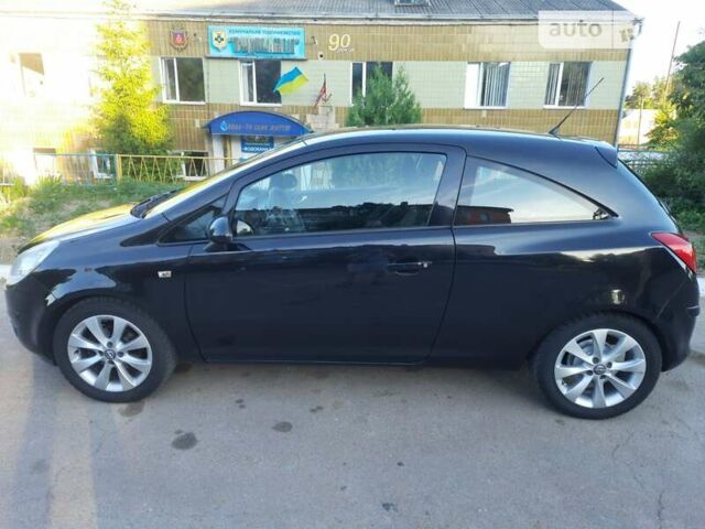 Черный Опель Корса, объемом двигателя 1 л и пробегом 225 тыс. км за 4700 $, фото 24 на Automoto.ua