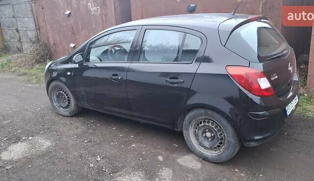 Чорний Опель Корса, об'ємом двигуна 1.23 л та пробігом 152 тис. км за 4200 $, фото 4 на Automoto.ua
