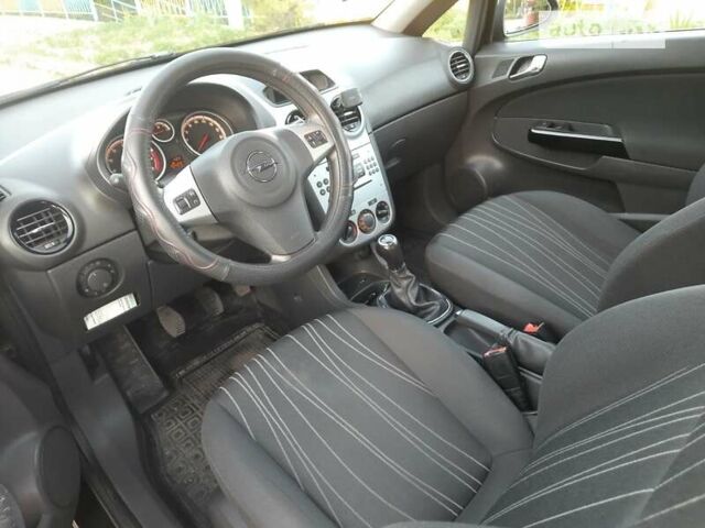 Черный Опель Корса, объемом двигателя 1 л и пробегом 225 тыс. км за 4700 $, фото 23 на Automoto.ua