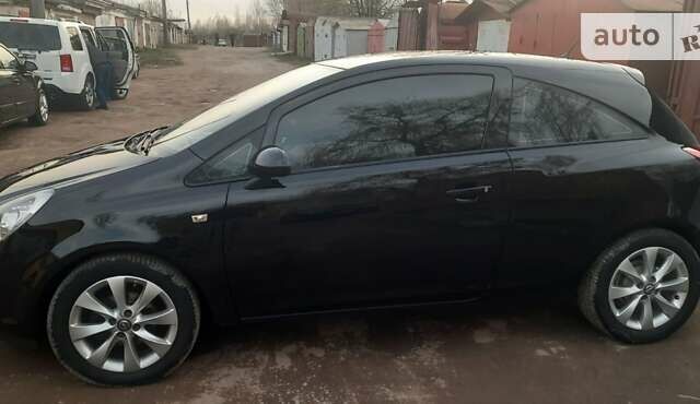 Черный Опель Корса, объемом двигателя 1 л и пробегом 225 тыс. км за 4700 $, фото 13 на Automoto.ua