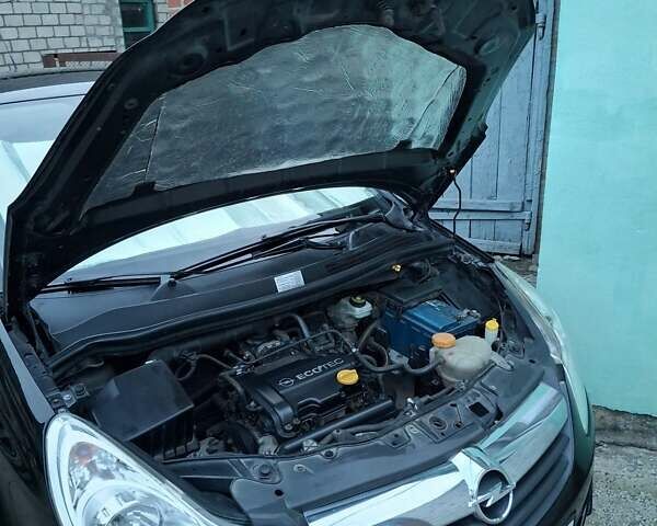 Черный Опель Корса, объемом двигателя 1 л и пробегом 225 тыс. км за 4700 $, фото 11 на Automoto.ua