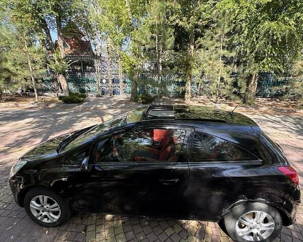Черный Опель Корса, объемом двигателя 1.25 л и пробегом 195 тыс. км за 4200 $, фото 15 на Automoto.ua