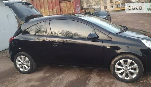 Черный Опель Корса, объемом двигателя 1 л и пробегом 225 тыс. км за 4700 $, фото 14 на Automoto.ua