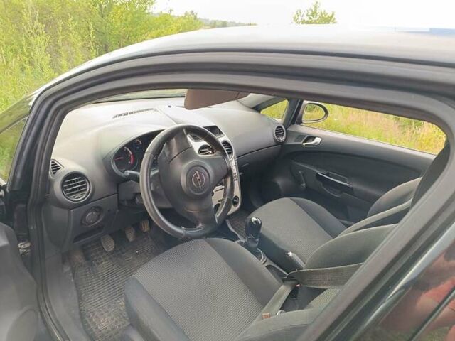 Черный Опель Корса, объемом двигателя 1.3 л и пробегом 233 тыс. км за 3599 $, фото 11 на Automoto.ua