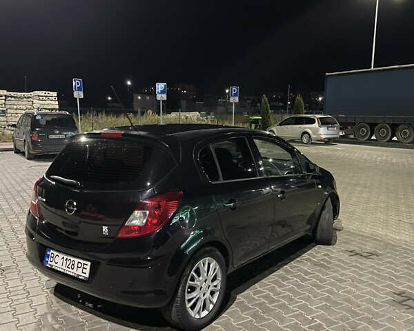 Чорний Опель Корса, об'ємом двигуна 1.23 л та пробігом 160 тис. км за 3500 $, фото 9 на Automoto.ua