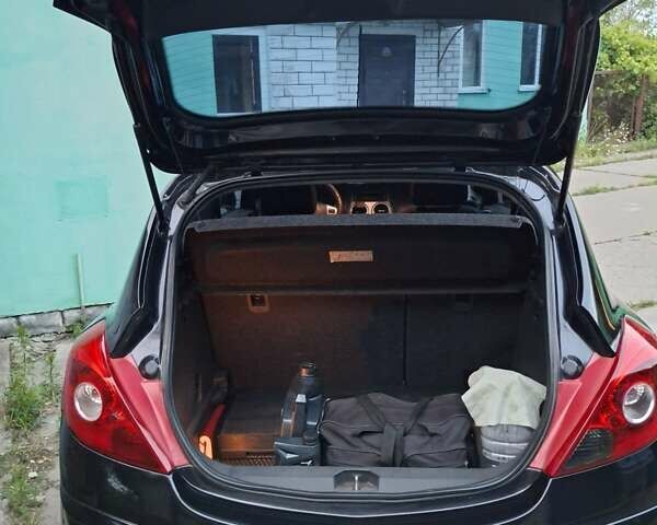 Черный Опель Корса, объемом двигателя 1 л и пробегом 225 тыс. км за 4700 $, фото 2 на Automoto.ua