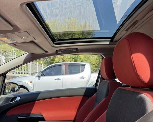 Черный Опель Корса, объемом двигателя 1.25 л и пробегом 195 тыс. км за 4200 $, фото 6 на Automoto.ua