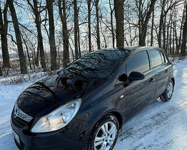 Черный Опель Корса, объемом двигателя 1.3 л и пробегом 198 тыс. км за 4500 $, фото 2 на Automoto.ua