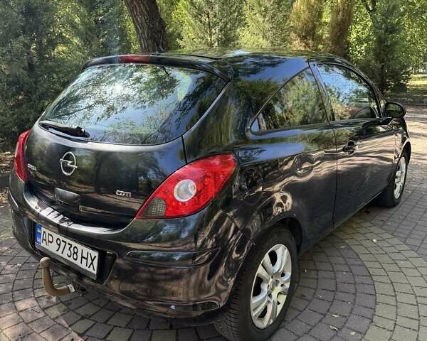 Черный Опель Корса, объемом двигателя 1.25 л и пробегом 195 тыс. км за 4200 $, фото 2 на Automoto.ua