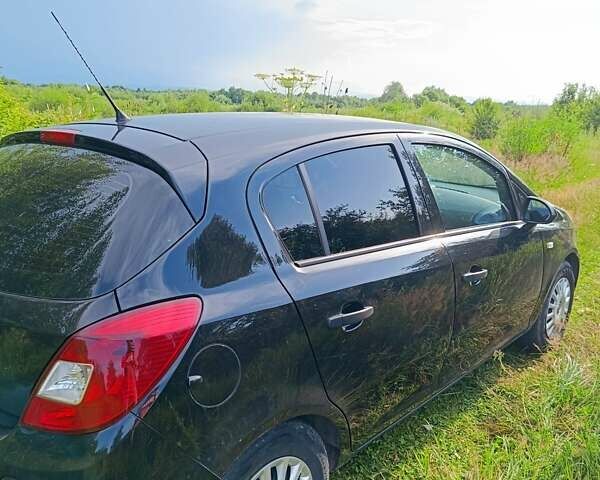 Черный Опель Корса, объемом двигателя 1.3 л и пробегом 233 тыс. км за 3599 $, фото 4 на Automoto.ua