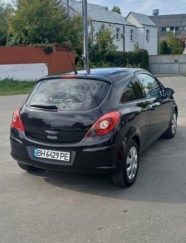 Черный Опель Корса, объемом двигателя 1.23 л и пробегом 100 тыс. км за 4700 $, фото 7 на Automoto.ua