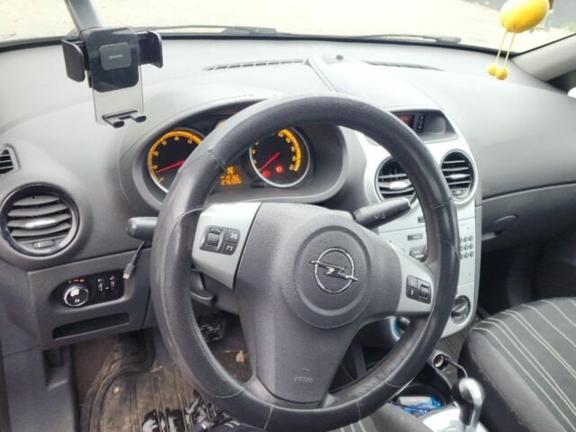 Черный Опель Корса, объемом двигателя 1.2 л и пробегом 276 тыс. км за 4100 $, фото 5 на Automoto.ua