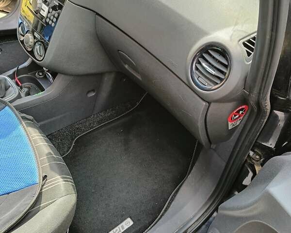 Чорний Опель Корса, об'ємом двигуна 1.25 л та пробігом 235 тис. км за 4599 $, фото 13 на Automoto.ua