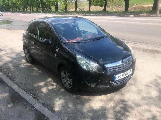 Черный Опель Корса, объемом двигателя 1.2 л и пробегом 210 тыс. км за 4600 $, фото 1 на Automoto.ua