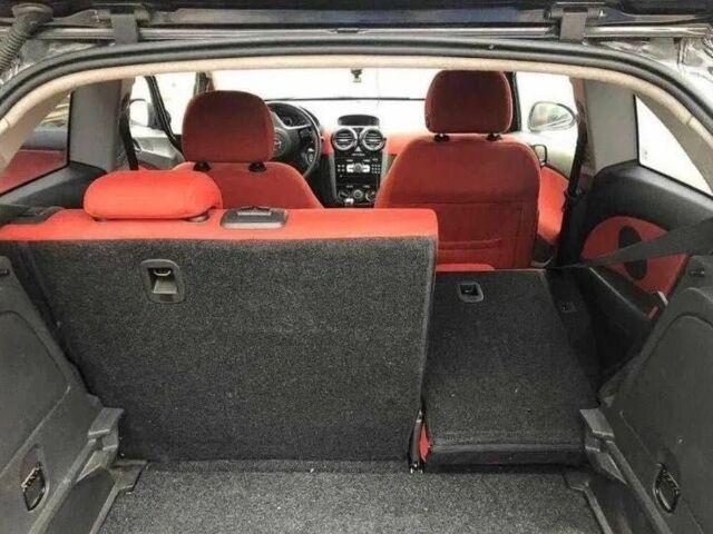 Черный Опель Корса, объемом двигателя 1.2 л и пробегом 210 тыс. км за 4600 $, фото 4 на Automoto.ua